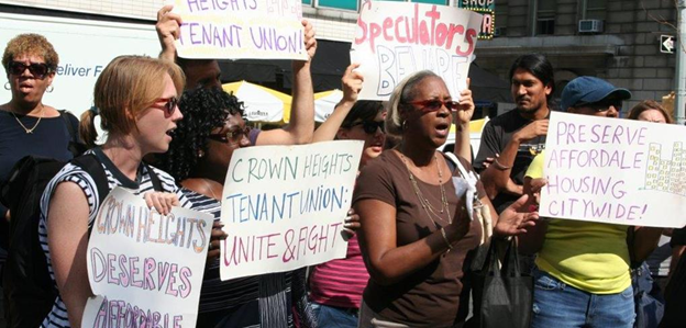 Tenant union activists demonstrating in Crown Heights, Brooklyn, for affordable housing. 